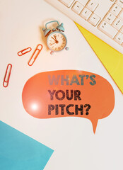 Text sign showing What S Is Your Pitch question. Business photo text asking about property of sound or music tone Flat lay above table with copy space on the bubble paper with clock and paper clips