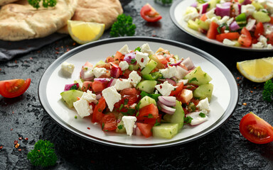 Turkish Shepards Salad with cucumber, tomato, red onion, pepper, parsley pita bread and Feta cheese