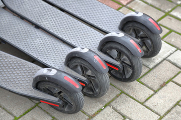 Modern miniature electric scooter for city walks and trips