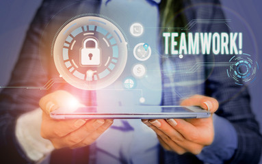 Writing note showing Teamwork. Business concept for combined action of group especially when effective and efficient Picture photo network scheme with modern smart device