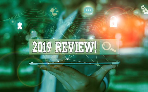 Text sign showing 2019 Review. Business photo showcasing remembering past year events main actions or good shows Picture photo system network scheme modern technology smart device