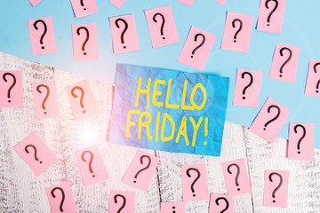 Handwriting text writing Hello Friday. Conceptual photo used to express happiness from beginning of fresh week Scribbled and crumbling papers with thick cardboard above wooden table