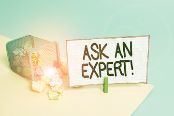 Conceptual hand writing showing Ask An Expert. Concept meaning confirmation that have read understand and agree with guidelines Trash bin crumpled paper clothespin reminder office supplies