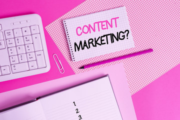 Writing note showing Content Marketing question. Business concept for involves creation and sharing of online material Writing equipments and computer stuffs placed above colored plain table