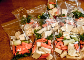 vegetables in pouches prepared for freezing, parsley, celery, carrots. perfect for preparing dinners, soups