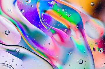 Zelfklevend Fotobehang Abstracte macro achtergrond van bewegende oliedruppels © lithiumphoto