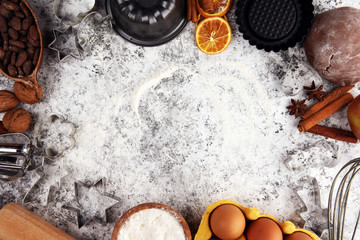Baking christmas cookies. Typical cinnamon stars bakery with spices. xmas decoration on table