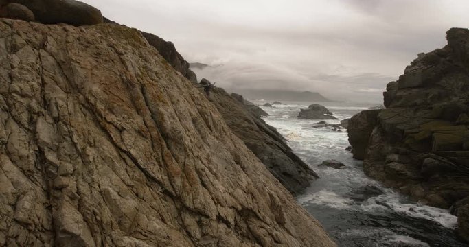 Tracking Slow Motion Storm Ocean With Mountain Bikers Hiking Past