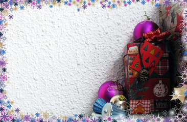 Naklejka premium View of a Christmas background with christmas balls, gifts and decoration