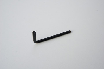 Six-sided wrench in chromium and black color.
