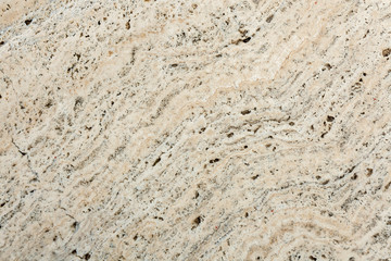 A natural stone. Facing tiles. Paving slabs. Granite. Marble. Crushed stone Texture. Terrace. The territory near the pool. Material. Limestone.
