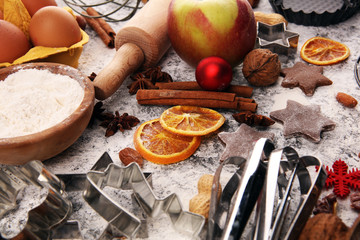 Baking christmas cookies. Typical cinnamon stars bakery with spices. xmas decoration on table