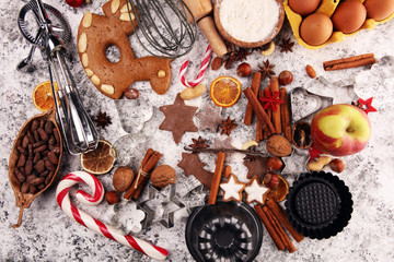 Christmas cookies and spices on rustic background with decoration