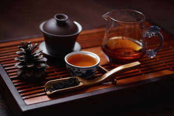 Chinese tableware for tea ceremony on dark background