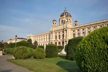 Fototapeta na wymiar Beautiful view of world famous Naturhistorisches or Natural History Museum, with park on the Ring strasse. Exterior view from Maria Theresa Square