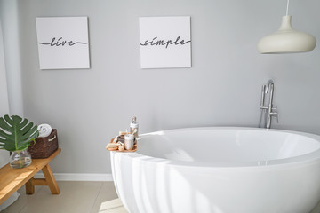 Naklejka na ściany i meble Modern bathtub of stylish interior