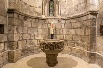 Baptismal font of the sanctuary of Our Lady of Estibaliz, Alava, Spain - obrazy, fototapety, plakaty