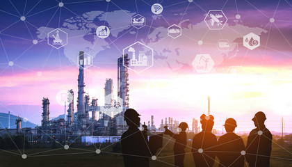 Double exposure Silhouette of the engineering team is working at the oil and gas refinery in a large energy industrial ,and physical system icons concept, Industry 4.0 concept.