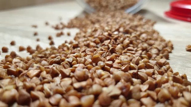 Buckwheat. Buckwheat kernels. Buckwheat close-up. Dietary grits.