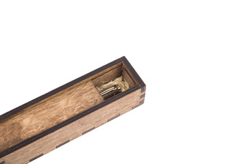 Beautiful wooden box with ballpoint pen inside on a white background.