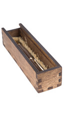 Beautiful wooden box with ballpoint pen inside on a white background.