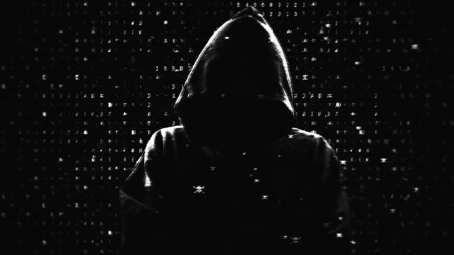 Black-white mystical silhouette of a hacker on the background of binary code and pirate skulls