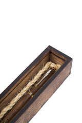 Beautiful wooden box with ballpoint pen inside on a white background.