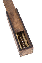 Beautiful wooden box with ballpoint pen inside on a white background.