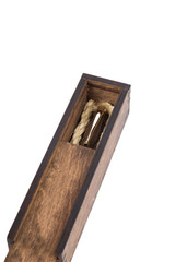 Beautiful wooden box with ballpoint pen inside on a white background.