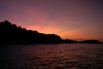 Fototapeta na wymiar A bright sunset in the Similan Islands in Thailand