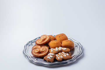 Images of cookies and sweets in a warm environment and with a white background.