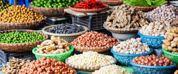 tropical spices and fruits sold at a local market in Hanoi (Vietnam)
