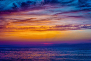 Naklejka na ściany i meble magnificant sunset on the mediterean sea in wonderful colors 