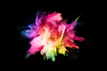 abstract colored dust explosion on a black background.abstract powder splatted background,Freeze motion of color powder exploding/throwing color powder, multicolored glitter texture.