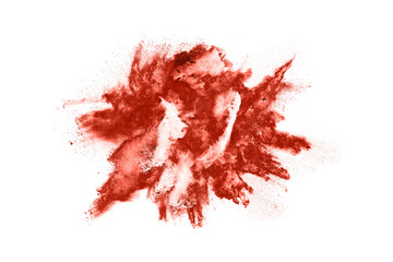 Brown color powder explosion on white background. Colored cloud. Colorful dust explode. Paint Holi.