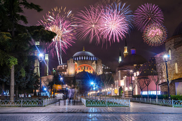 View of the Hagia Sophia at night with fireworks in Istanbul, Turkey.
