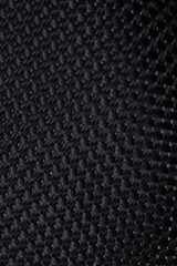 Black cloth weave pattern close up