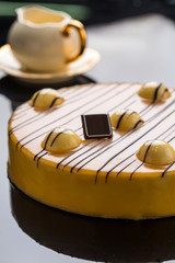 Obraz na płótnie Canvas Vanilla cake with white Chocolate glaze