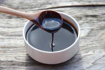 molasses that remains as a residue from the crystallization of cane sugar and is used as food and...