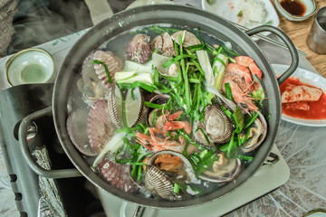 Korean style clam soup in clay pot