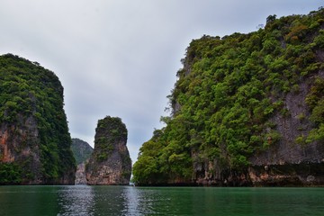 Island, Ocean views near Phuket Thailand with Blues, Turquoise and Greens oceans, mountains, boats,...