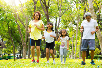 elderly and family exercise in the park