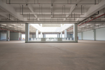 Large warehouse interior concrete building space