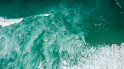 Top View texture Waves, Foaming and Splashing in the Ocean, Sunny Day