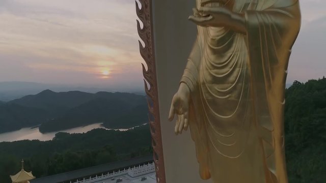 Buddha statue in Donglin Temple. Jiangxi: China. Donglin Buddha is the world's first high Amitabha like. Located in the famous Mount Lu in china. (aerial photography)