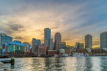 Boston skyline from Fan Pier at the fantastic twilight time with smooth water river, Massachusetts, USA downtown skyscrapers, United states of Amercia, Architecture and building with tourist concept