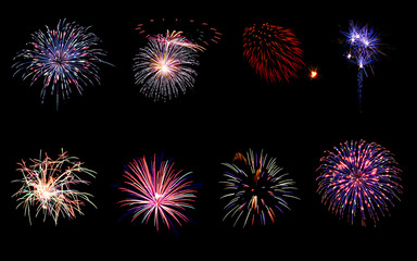 Variety of colorful fireworks isolated on black background
