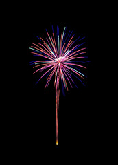 Beautiful colorful fireworks exploding in the night sky, isolated on black background