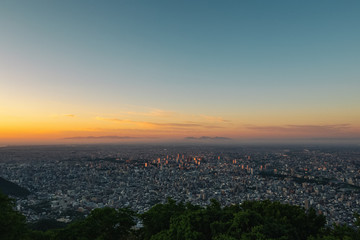 sunset over the city of Sapporo Hokkaido Japan