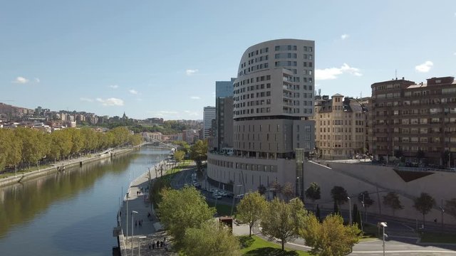 Nervion river in center of Bilbao, beautiful cityscape with many buildings